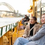 International students in a boat in Sydney Harbour