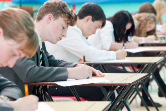 Students seated and taking an exam